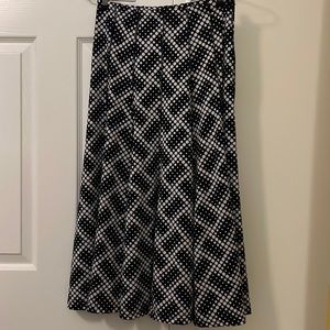 Black an white polkadots skirt size medium 95% polyester 5% spandex
